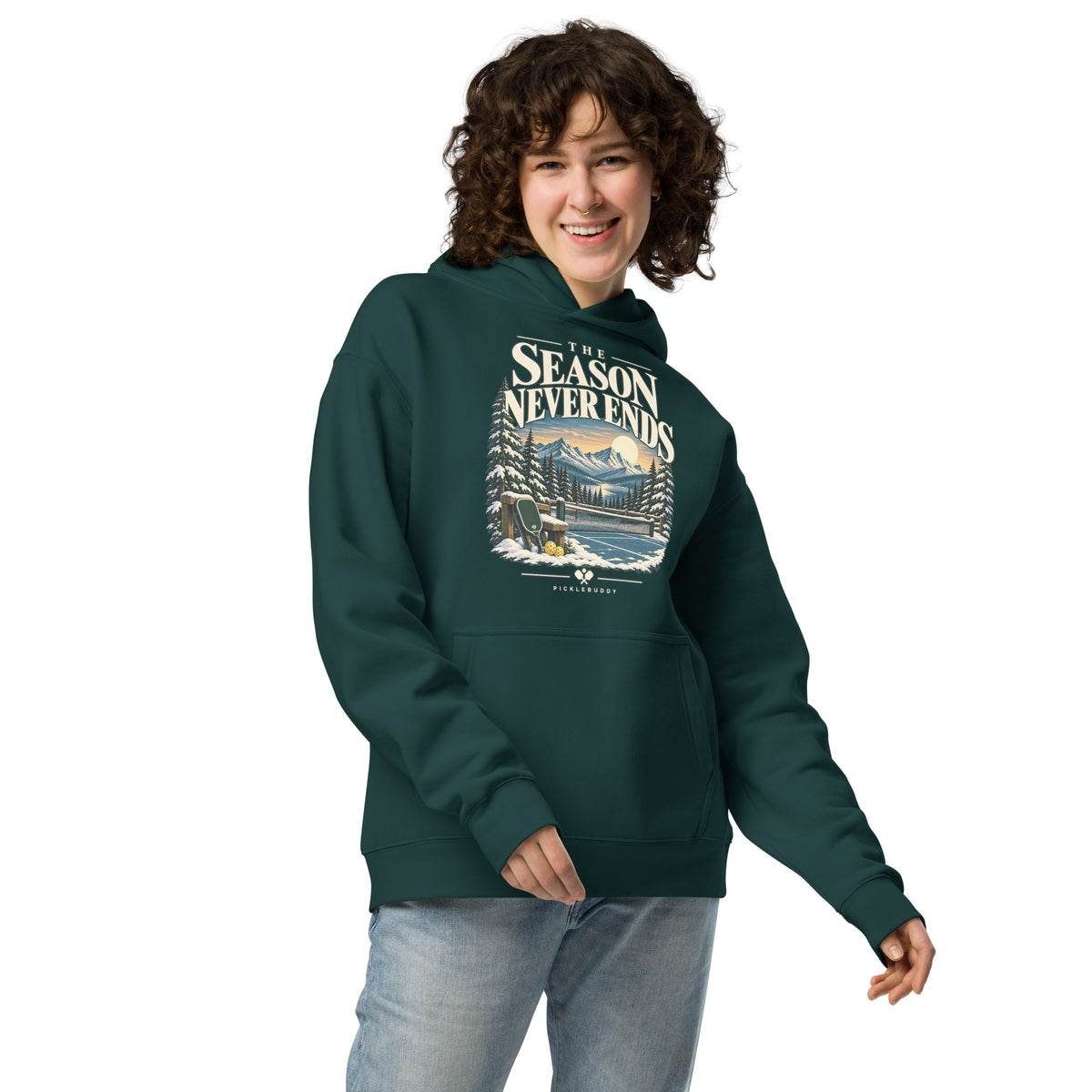The Season Never Ends design with snow-covered pickleball court and mountain landscape