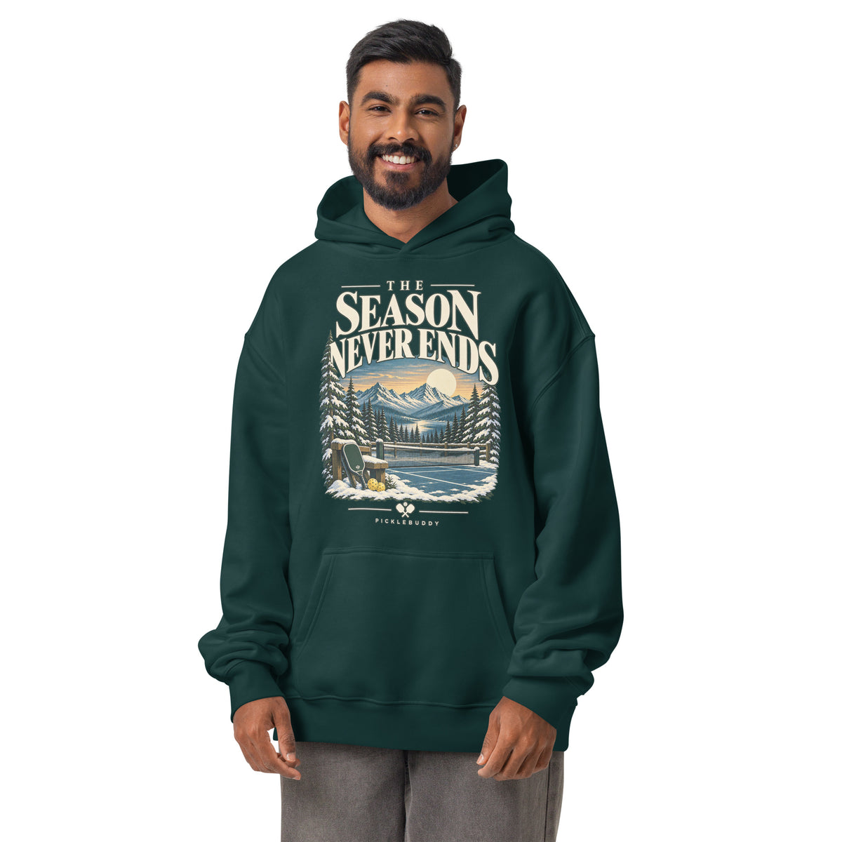 Snowy mountain pickleball court and vintage lettering printed on Pine Green hoodie